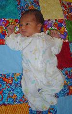 On my favorite quilt - thanks Meemaw !